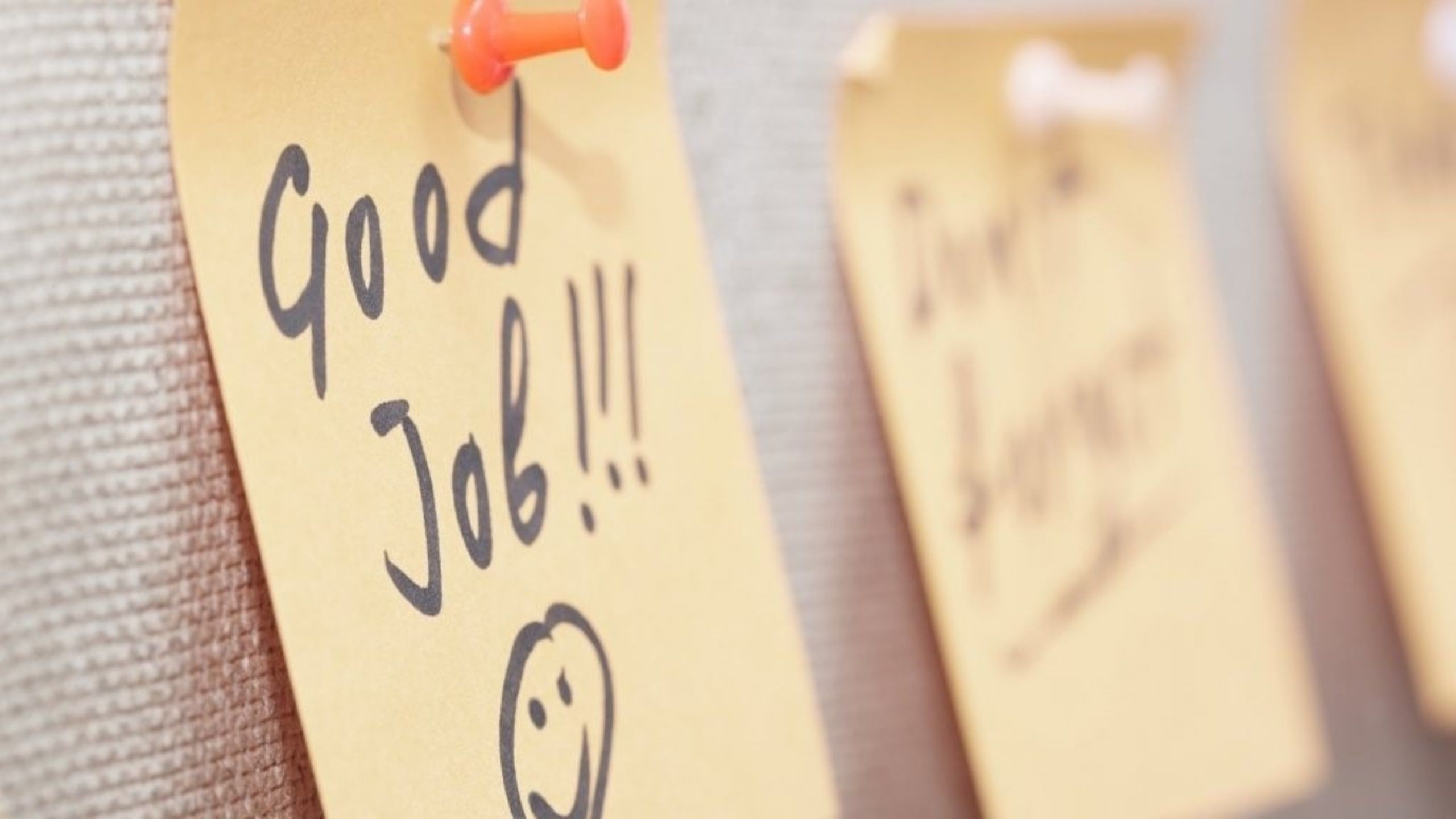a note says good job to motivate employees - employee recognition wall ideas