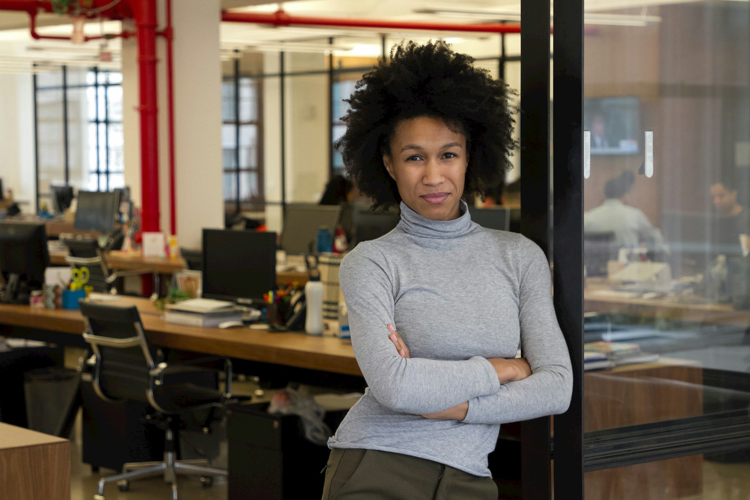 woman outside her office - Roles and Responsibilities of HR Operations