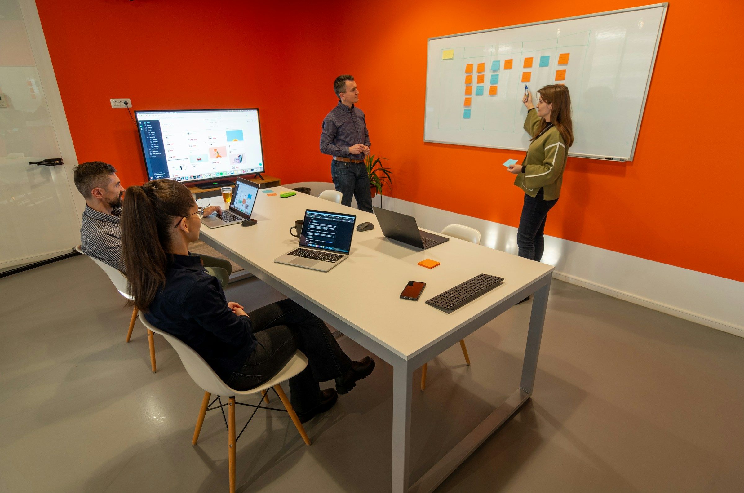 woman giving lecture - Onboarding Tasks