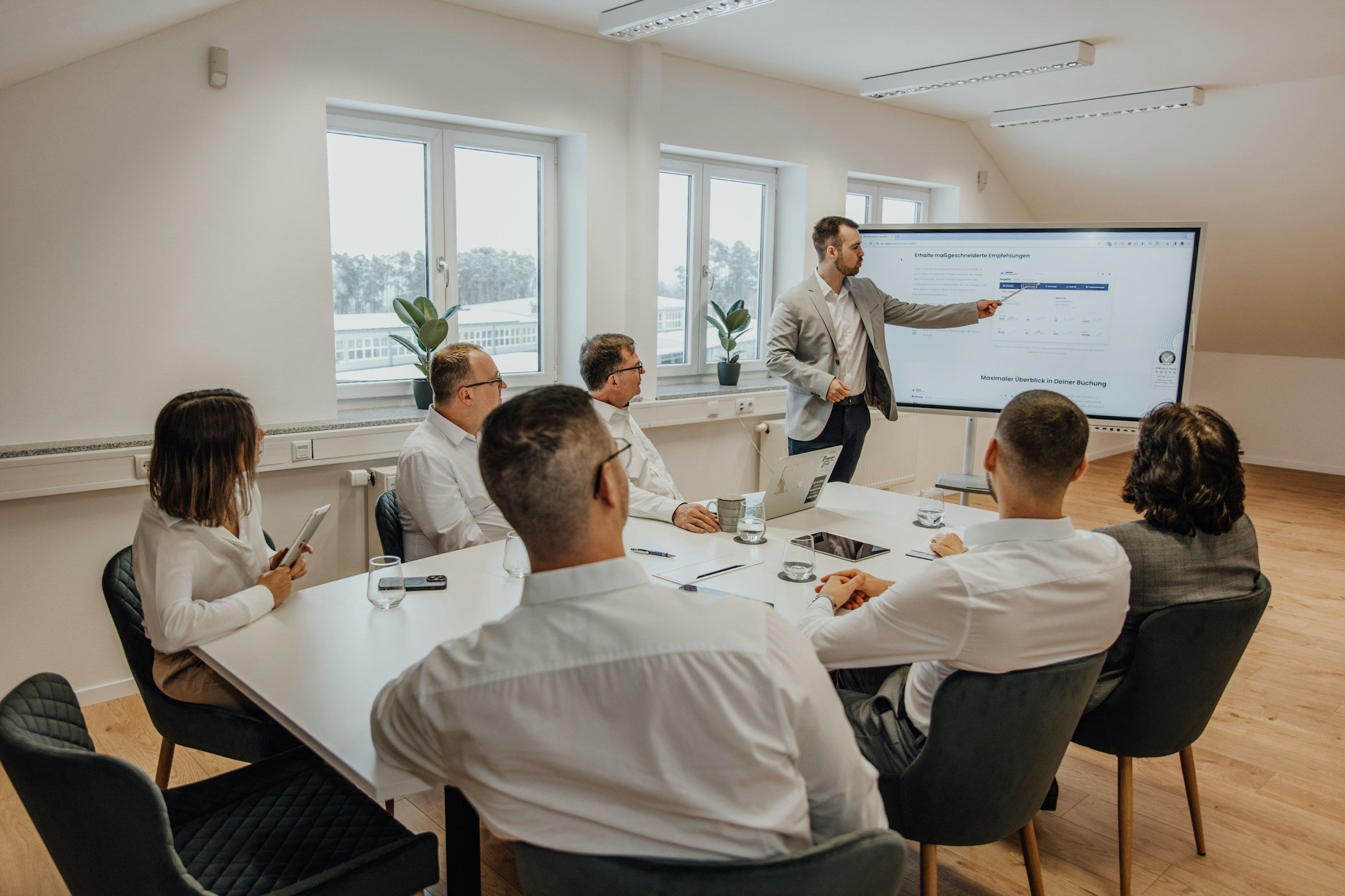 man in a small meeting - Employee Satisfaction KPI