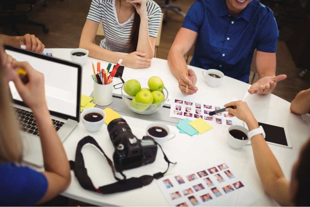 graphic designers working together - Ideas for Employee Appreciation Day