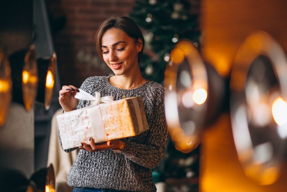 employee happy to receive gift - Why Corporate Gifting Is Important