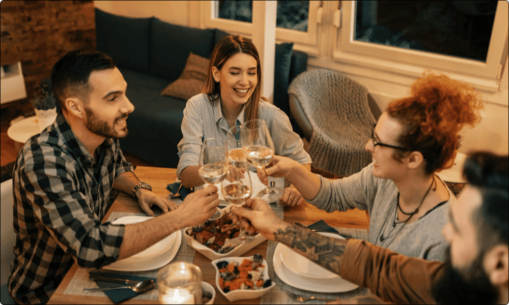 people cheering in a party - Employee Appreciation Party Ideas