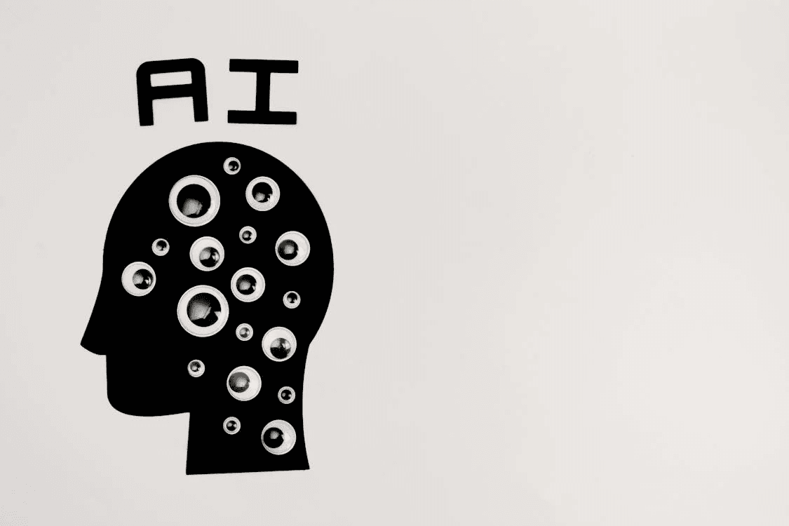 head of a person with a lot of eyes on it