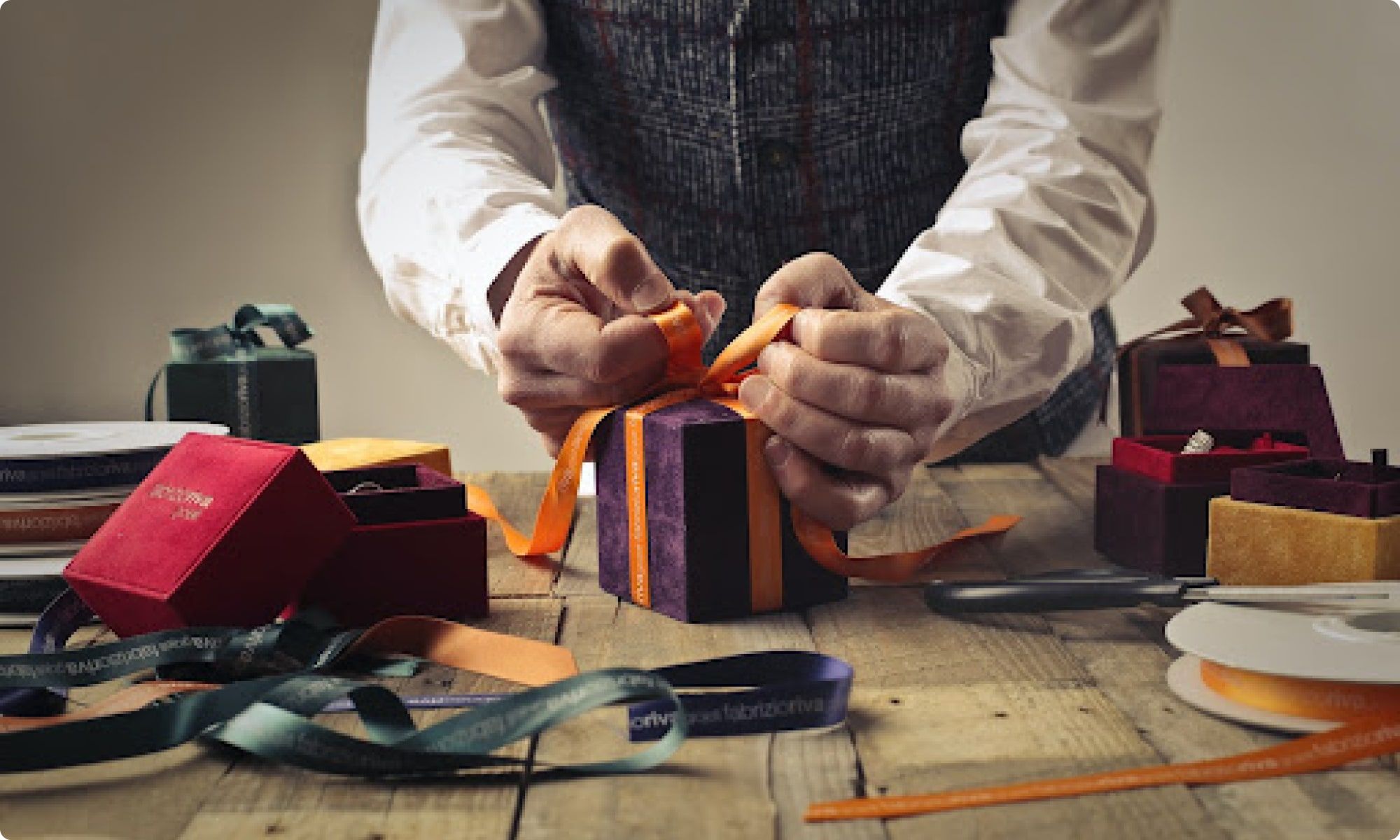 man packing meaningful corporate gifts