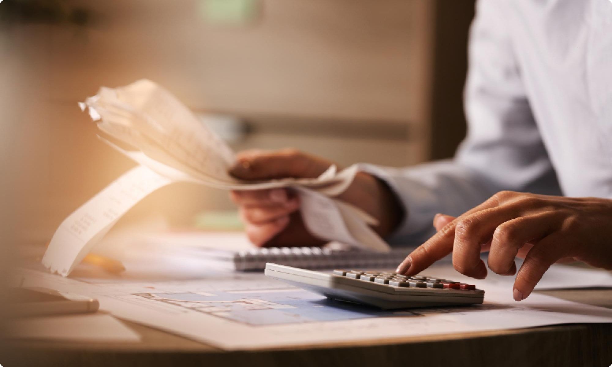 man calculating Employee Retention Rate