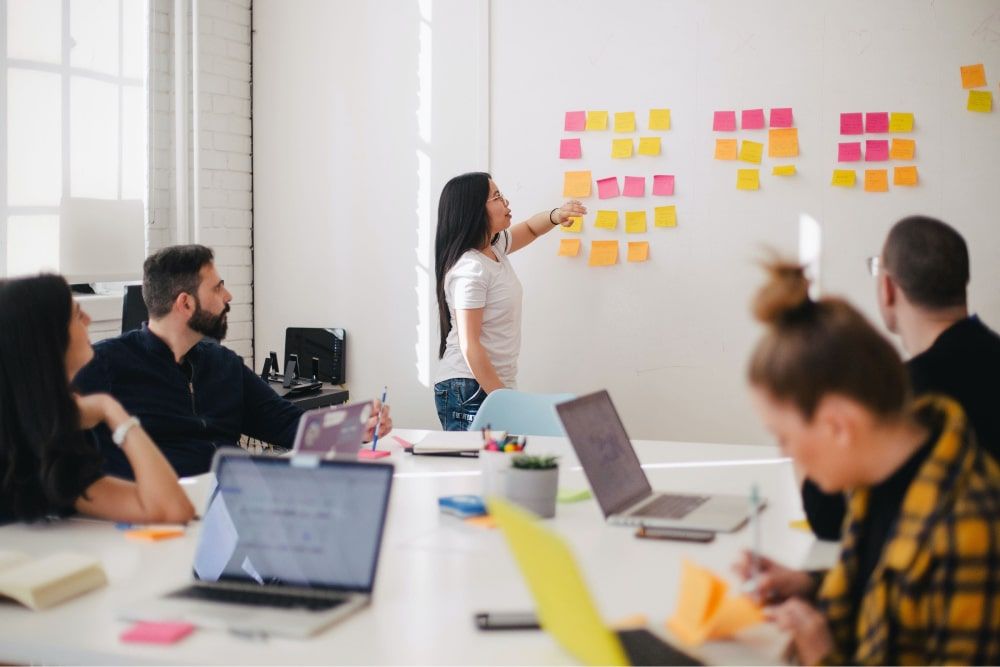 woman discussing Creative Ways To Retain Employees