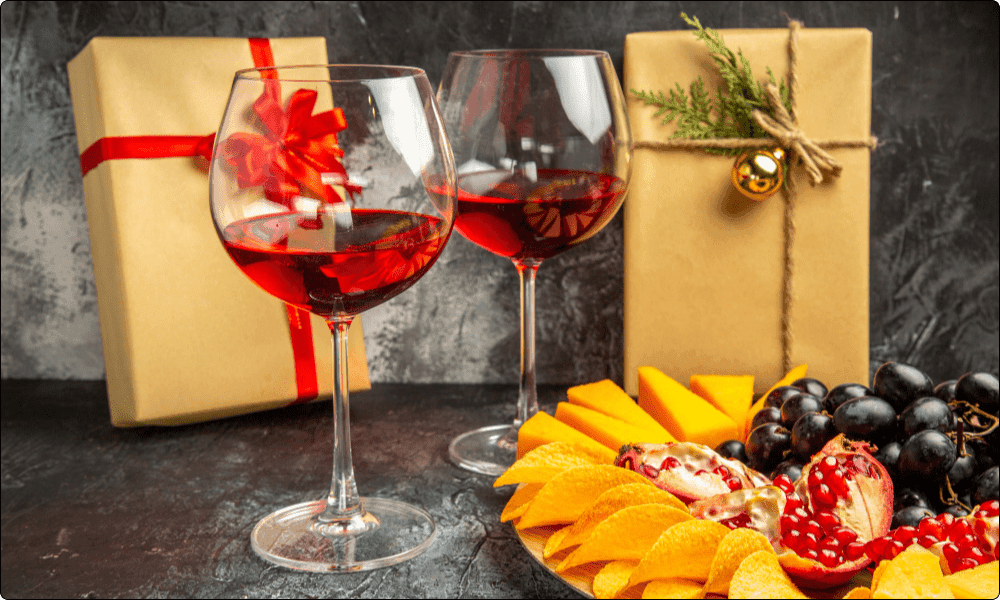 wine gifts with cheese pieces meat grapes pomegranate oval serving board